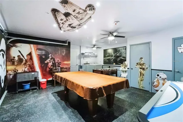 a bed room with a bed and a large window