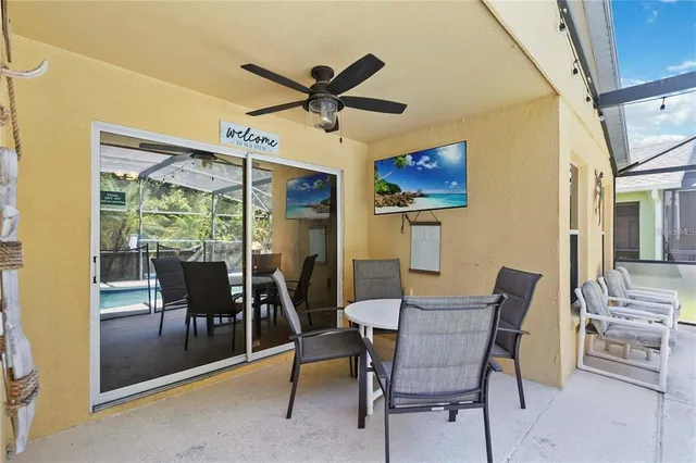 a view of a dining room with furniture window and outside view