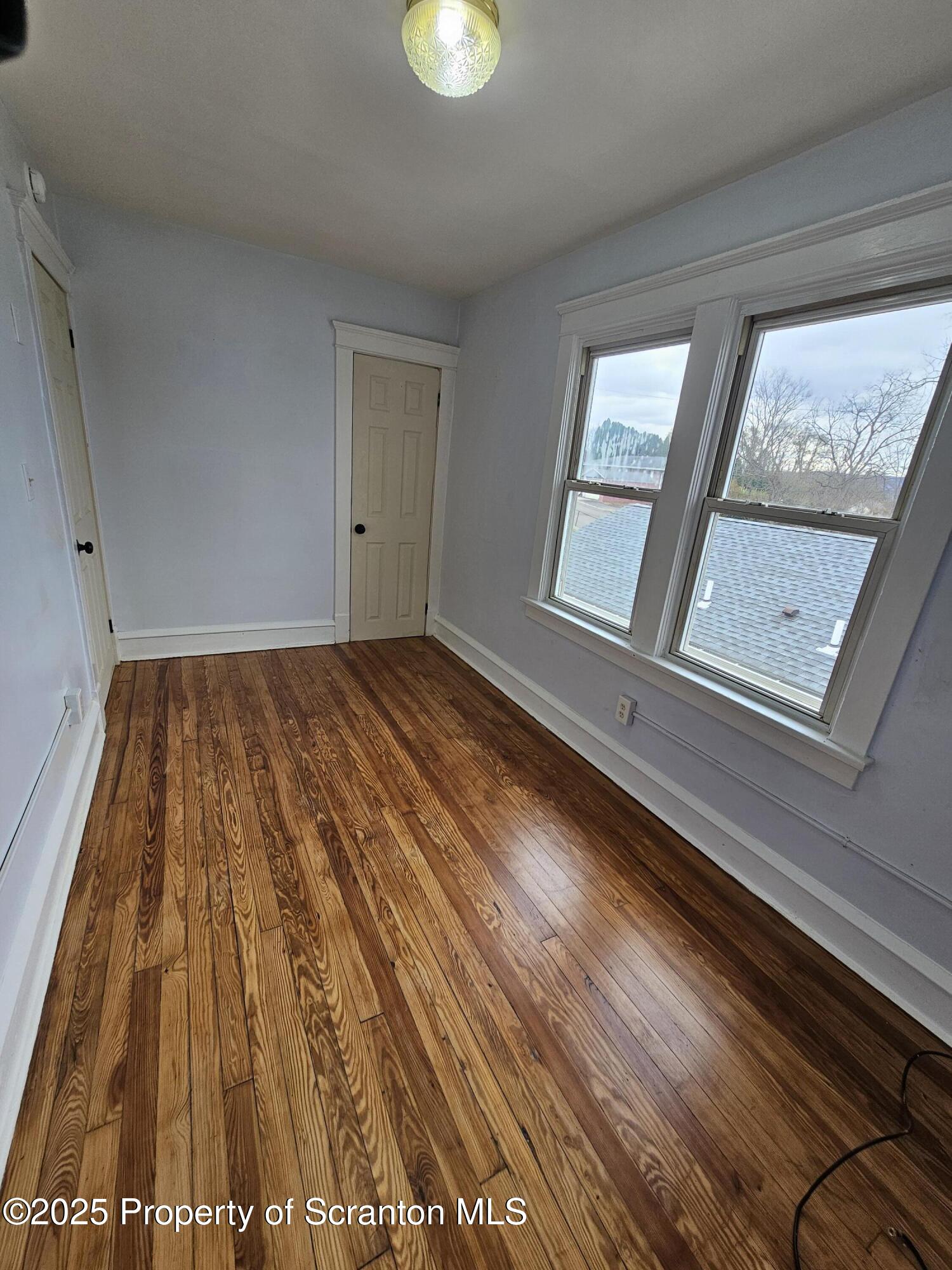 775 Bennett Street Luzerne, PA 18709 - Photo 13 of 18 a view of an empty room and window