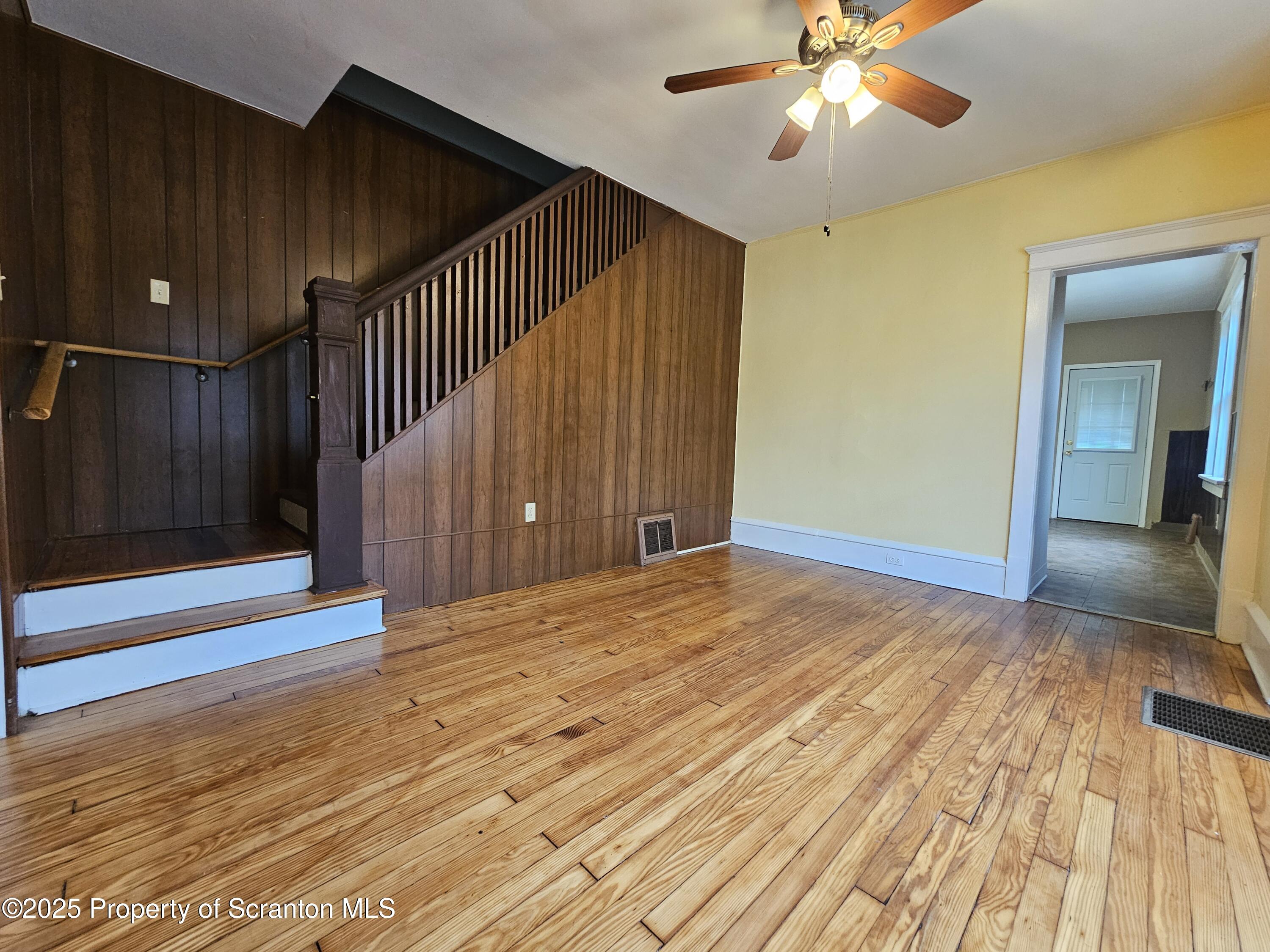 775 Bennett Street Luzerne, PA 18709 - Photo 4 of 18 a view of a livingroom with wooden floor