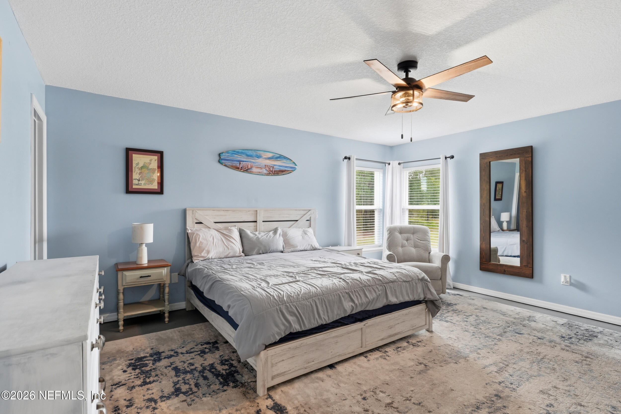 2471 Iris Street Middleburg, FL 32068 - Photo 20 of 40 a bedroom with a bed and a window