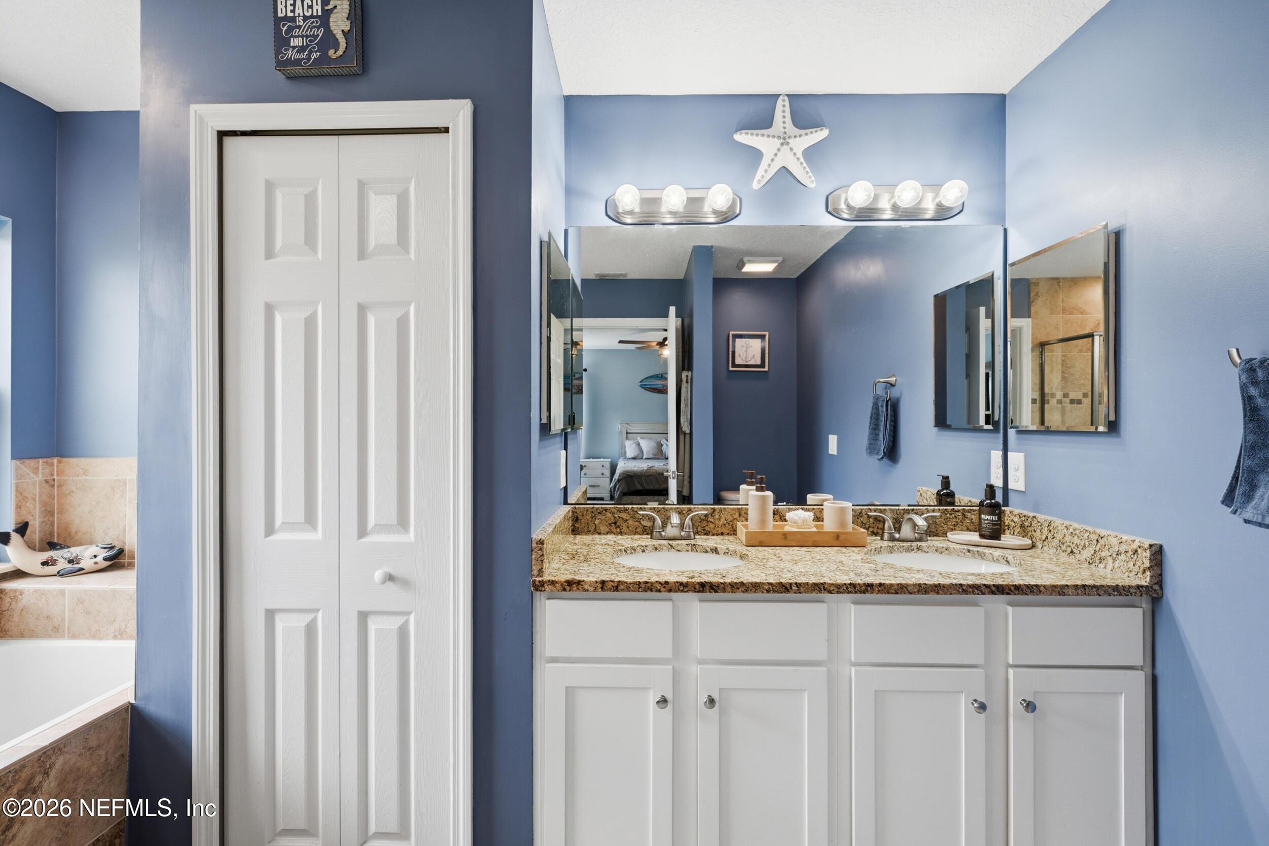 2471 Iris Street Middleburg, FL 32068 - Photo 24 of 40 a bathroom with a sink and a mirror