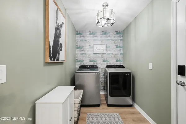 a bathroom with a stove and a shower