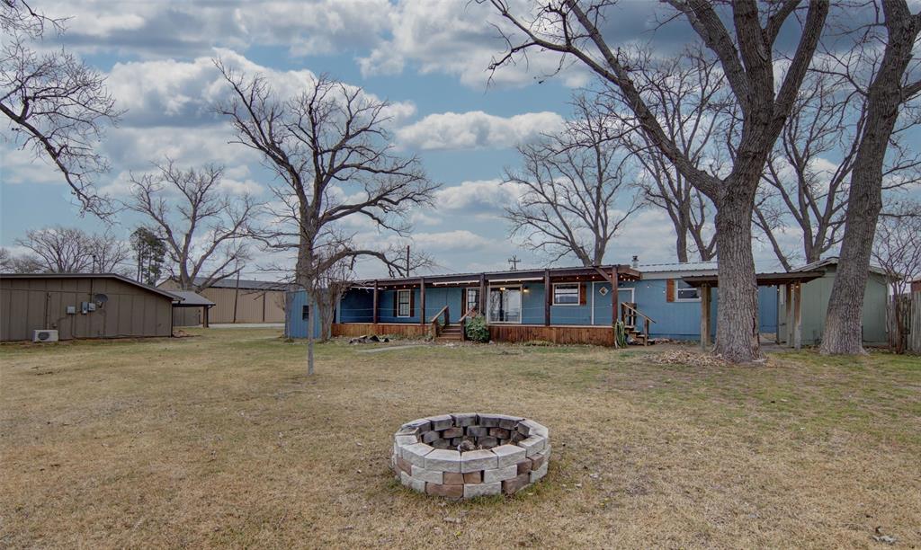 1059 Airport Road Graford, TX 76449 - Photo 28 of 37 Lakeside yard w firepit