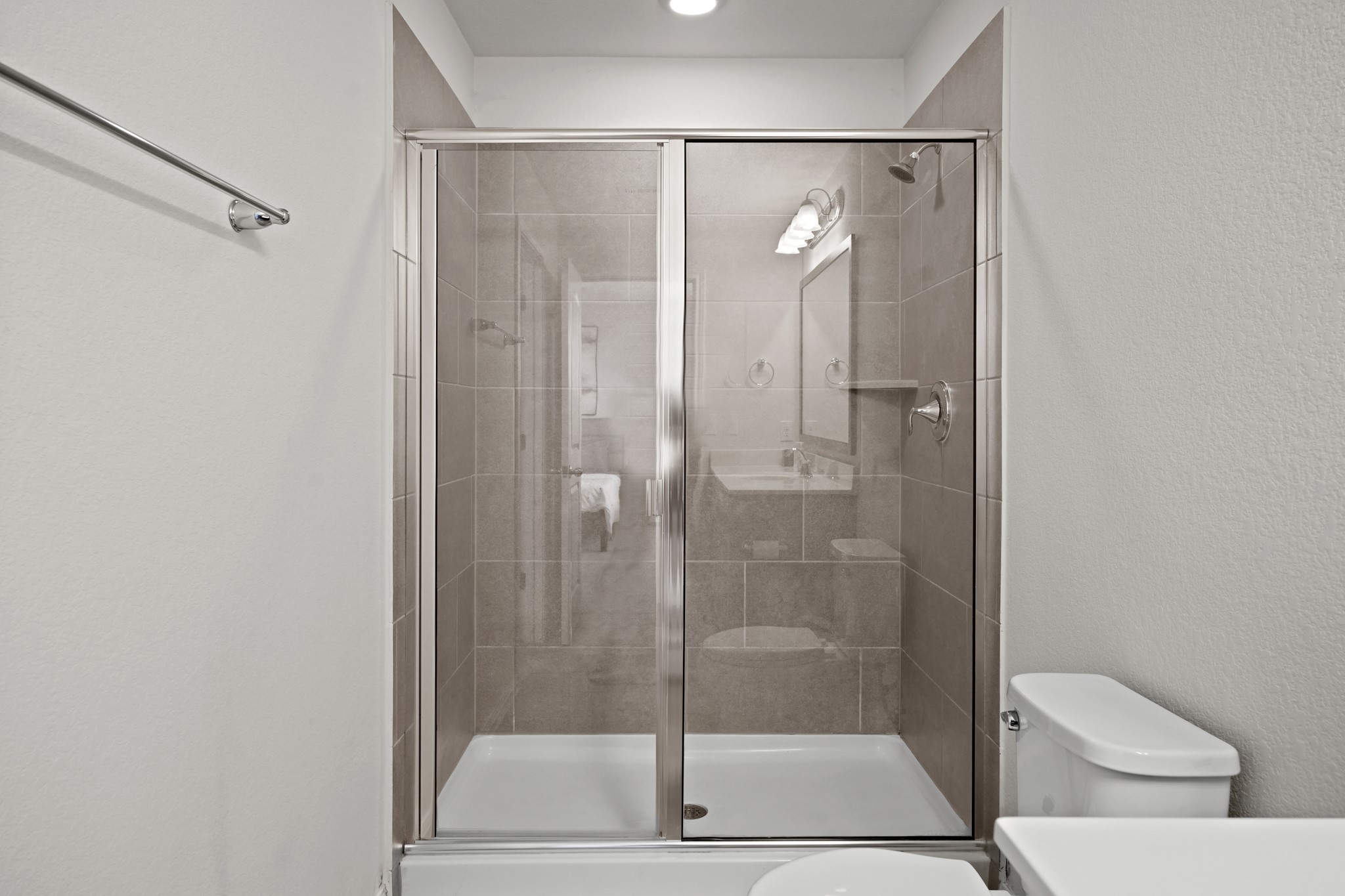 13005 Foreston Drive Austin, TX 78754 - Photo 31 of 36 a bathroom with a shower and toilet