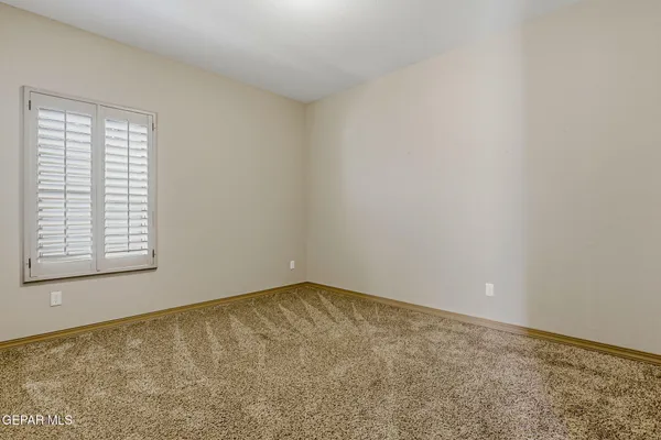 a kitchen with stainless steel appliances granite countertop a stove a microwave and a sink