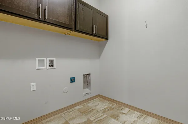 an aerial view of residential house and sandy dunes