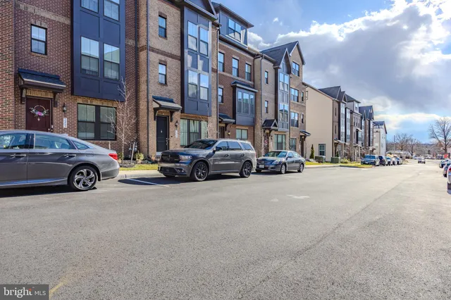 a view of a cars parked in front of a building