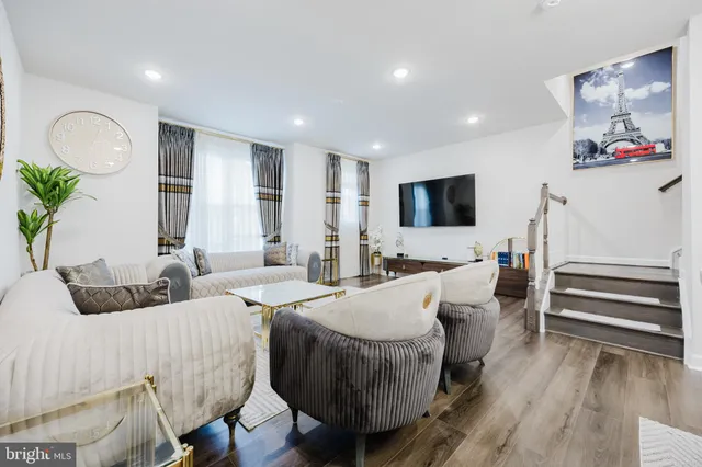 a bathroom with a double vanity sink mirror and shower