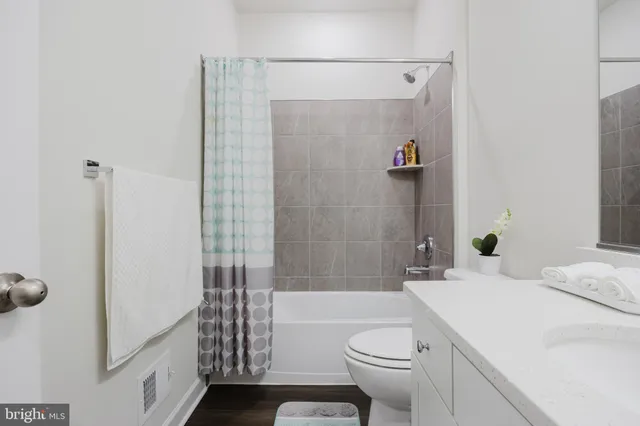 a view of a building with a street