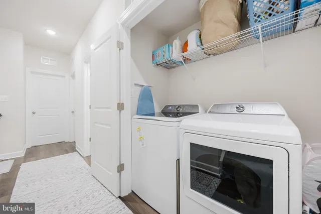 a view of a street with cars