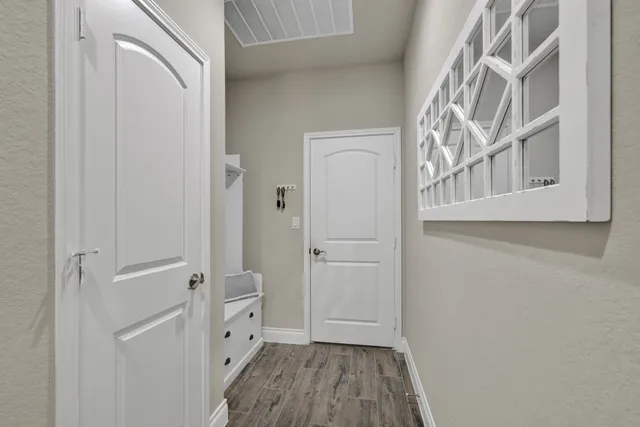 a view of a big house with a big yard