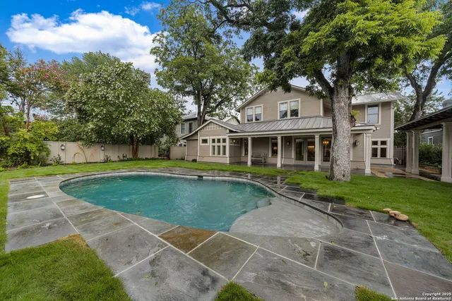 a view of a house with a swimming pool