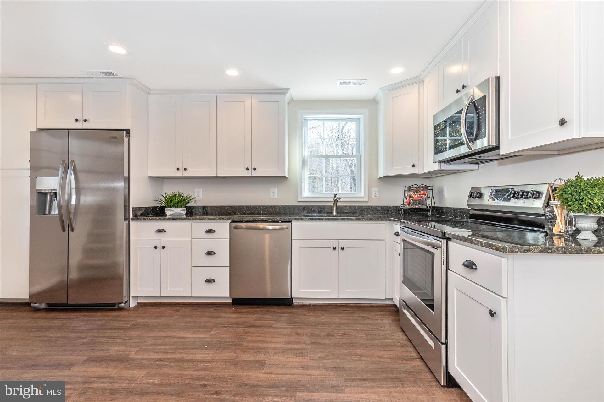 10602 Bethel Road Frederick, MD 21702 - Photo 12 of 33 Granite countertops and stainless steel appliances