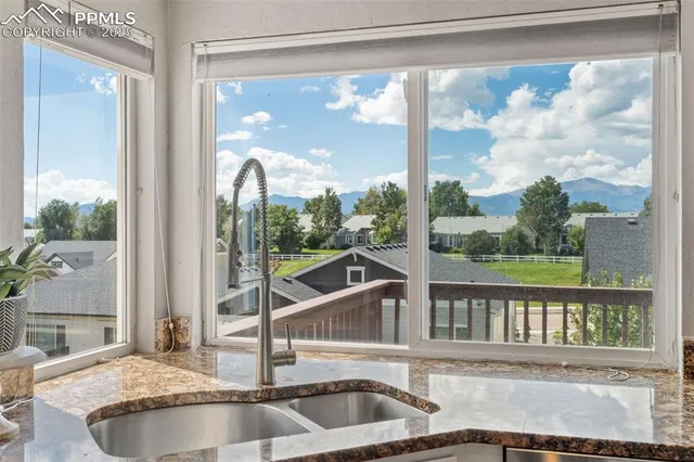 a view of a sink and window