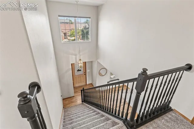 a view of entryway with wooden floor