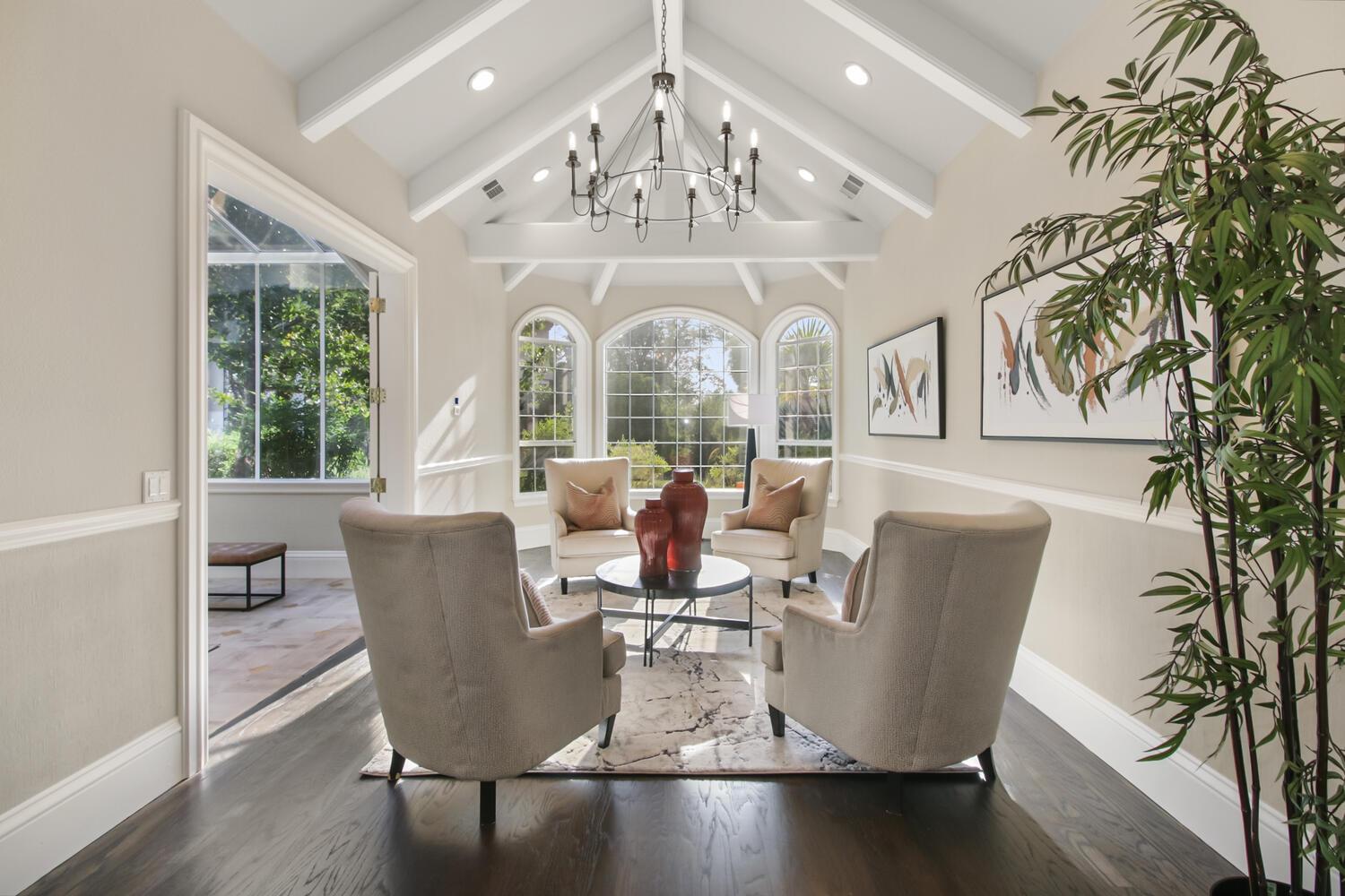 5001 Auburn Folsom Road Loomis, CA 95650 - Photo 22 of 99 a view of a dining room with furniture a chandelier and wooden floor