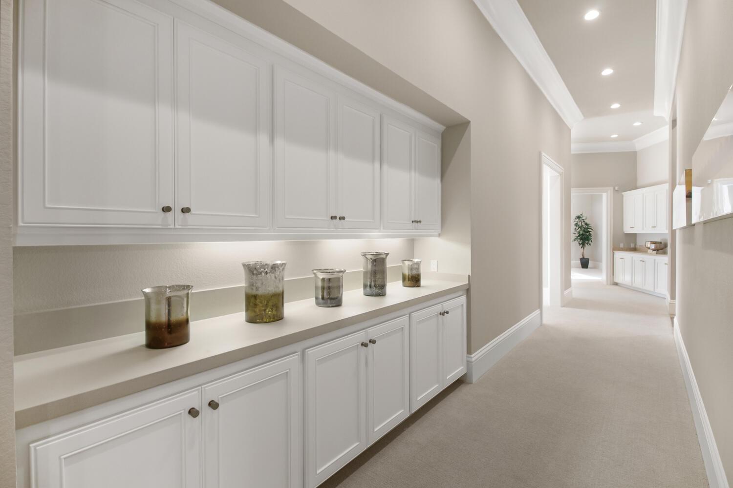 5001 Auburn Folsom Road Loomis, CA 95650 - Photo 39 of 99 a kitchen with white cabinets and white appliances