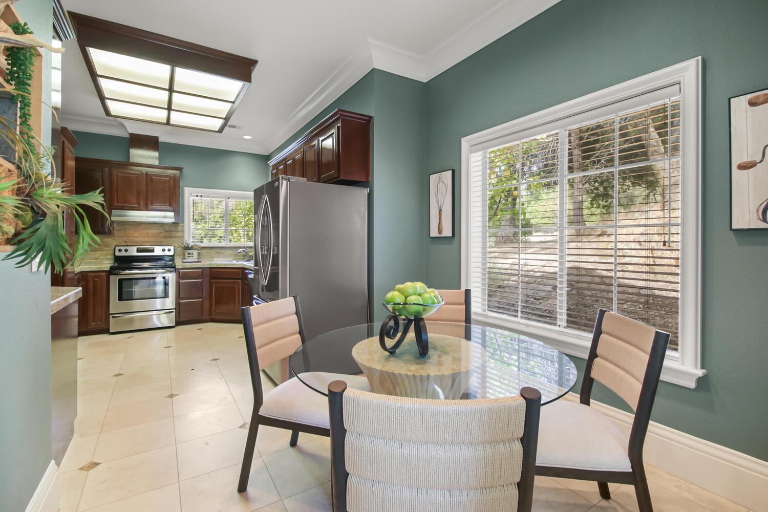 5001 Auburn Folsom Road Loomis, CA 95650 - Photo 70 of 99 a view of a dining room with furniture window and outside view