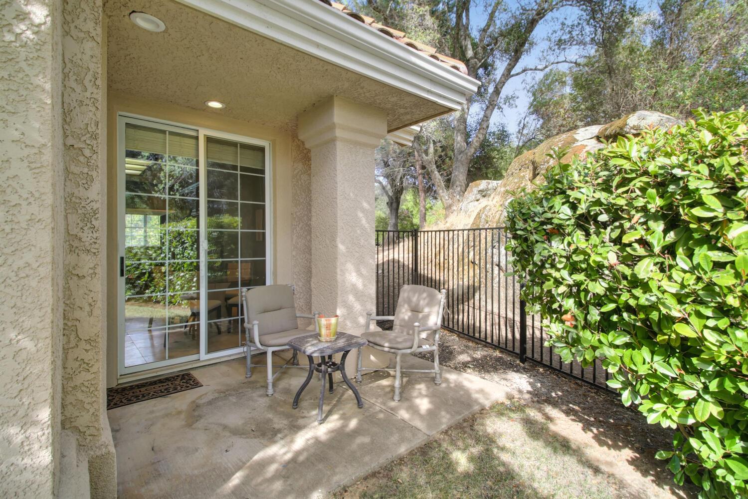5001 Auburn Folsom Road Loomis, CA 95650 - Photo 75 of 99 a building outdoor space with patio furniture and potted plants
