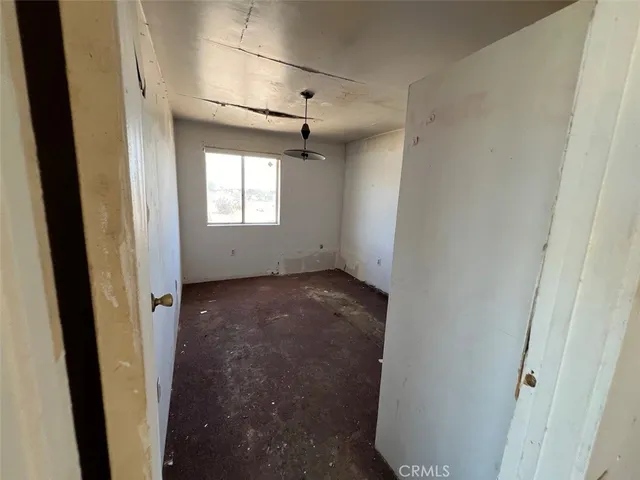 a view of a utility room with closet