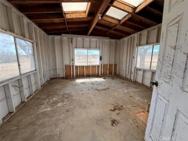 a view of a room with entryway