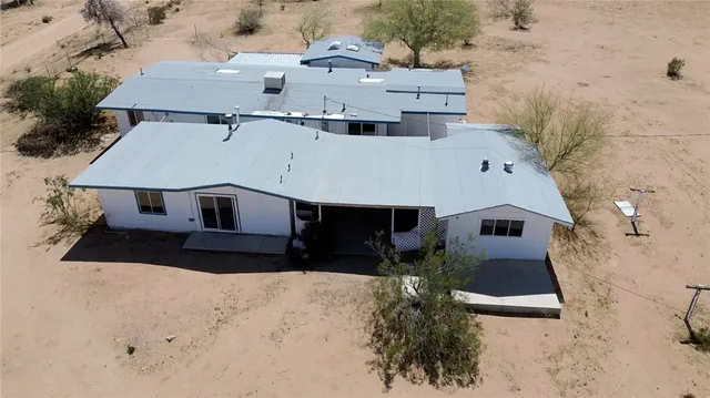 view of a bedroom with a small yard