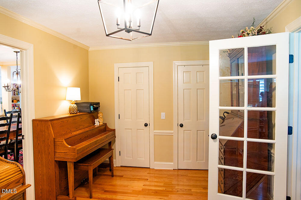 75 Frank Timberlake Road Timberlake, NC 27583 - Photo 12 of 93 a view of a room with wooden floor and cabinet
