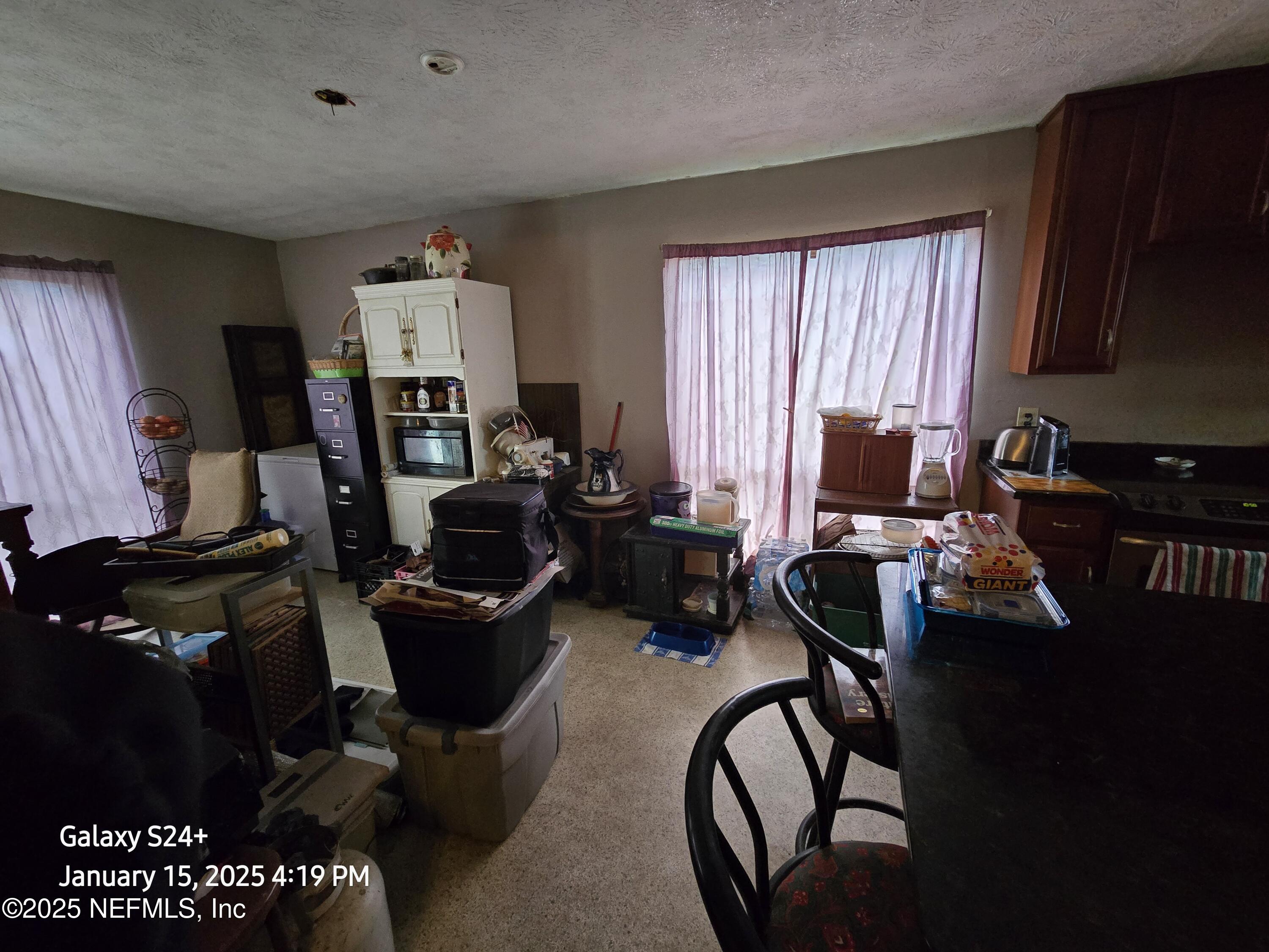 54 Spring Street St. Augustine, FL 32084 - Photo 13 of 31 a view of a workspace with furniture and a window