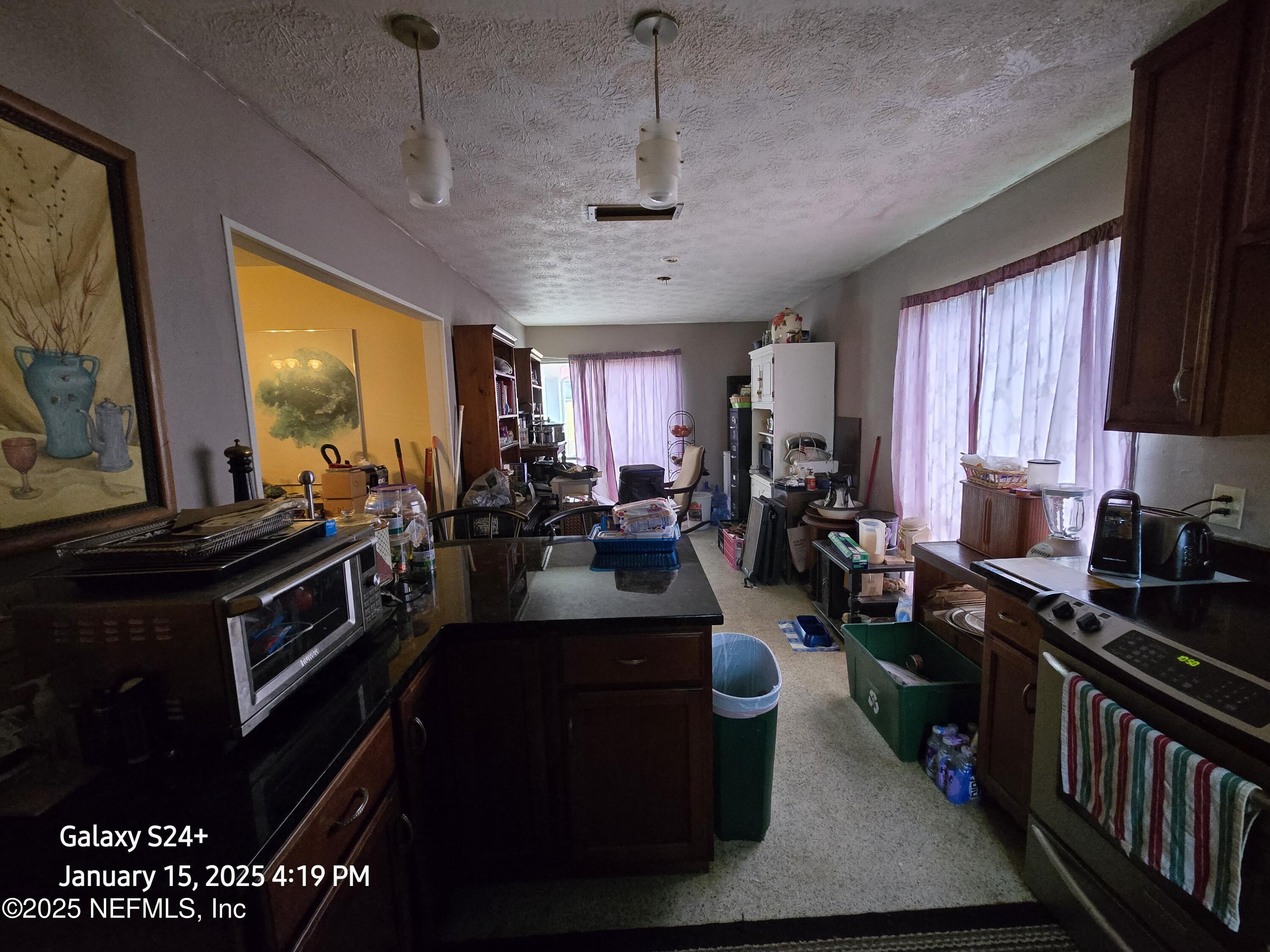 54 Spring Street St. Augustine, FL 32084 - Photo 14 of 31 a kitchen with lots of counter top space