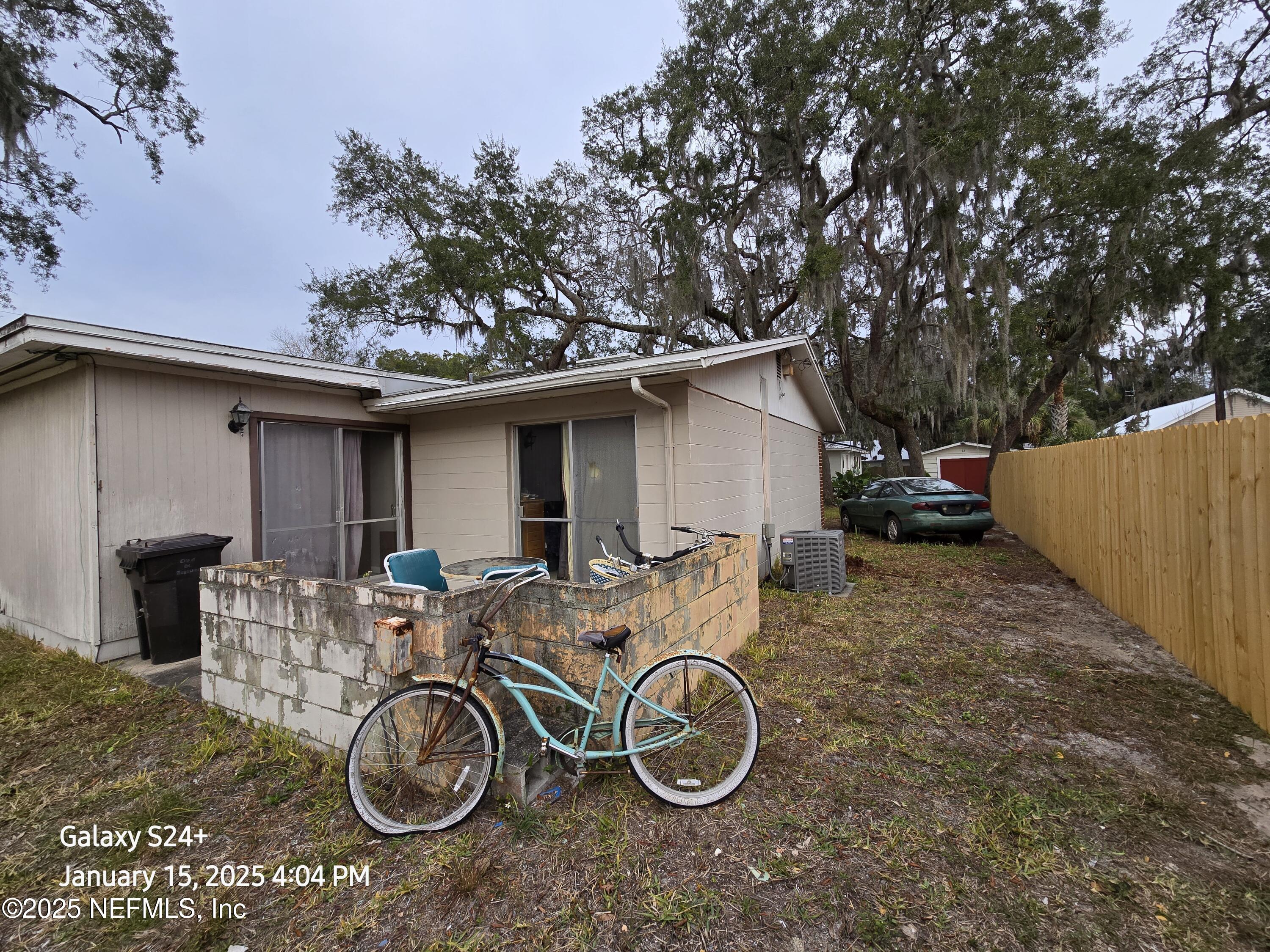 54 Spring Street St. Augustine, FL 32084 - Photo 4 of 31 a couple of bicycles parked in front of a house