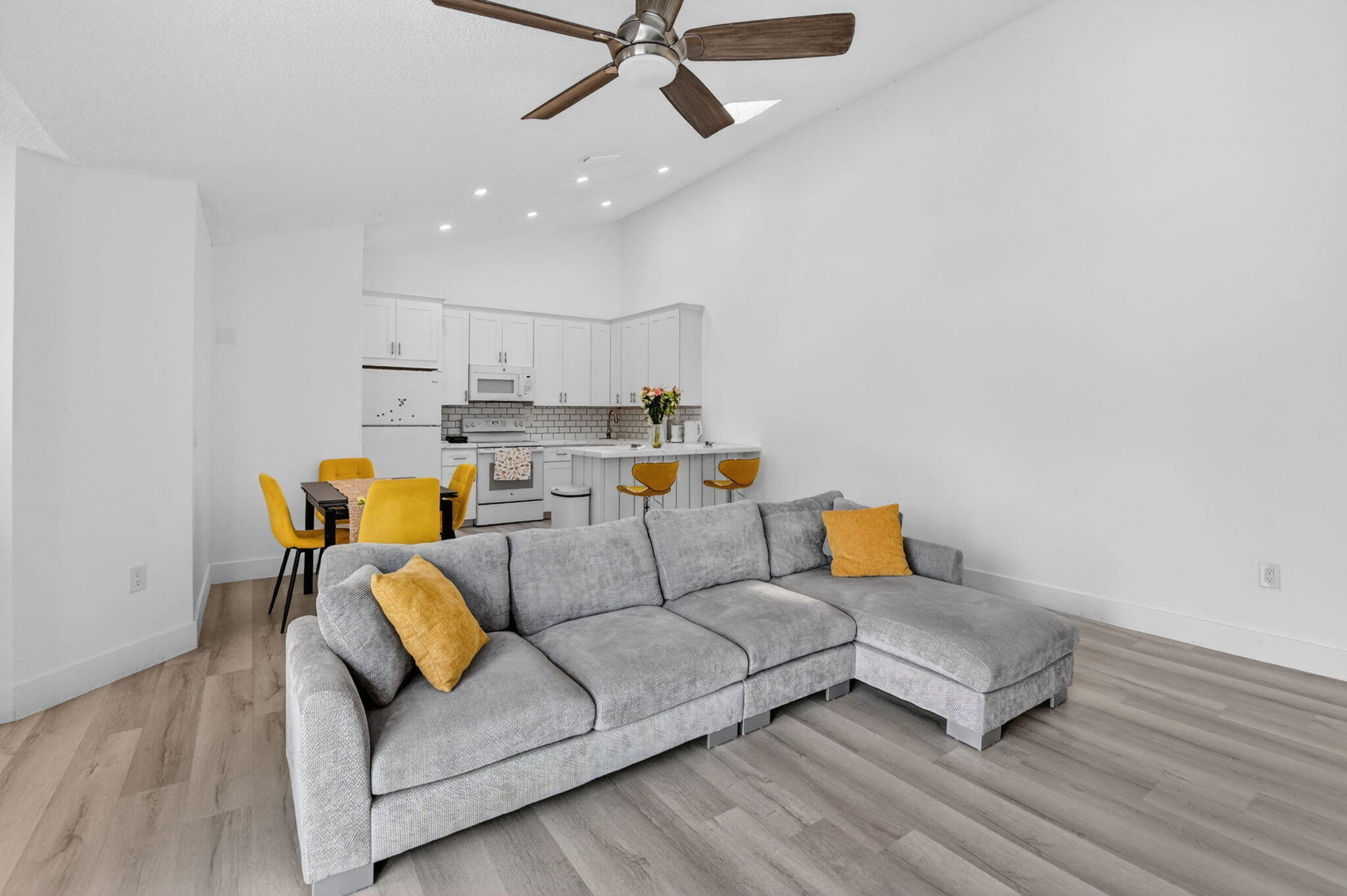 9903 Boca Gardens Trail Boca Raton, FL 33496 - Photo 14 of 37 a living room with furniture and a wooden floor