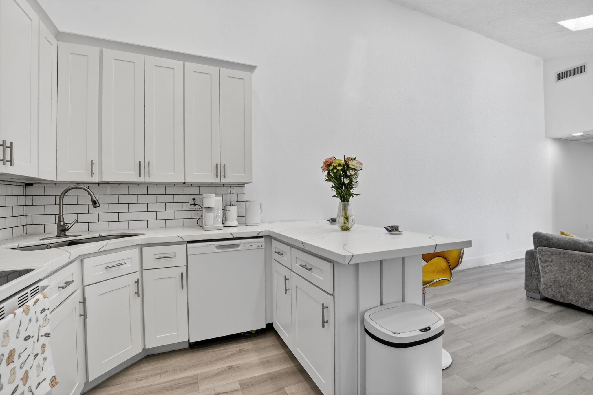 9903 Boca Gardens Trail Boca Raton, FL 33496 - Photo 18 of 37 a kitchen with sink and cabinets