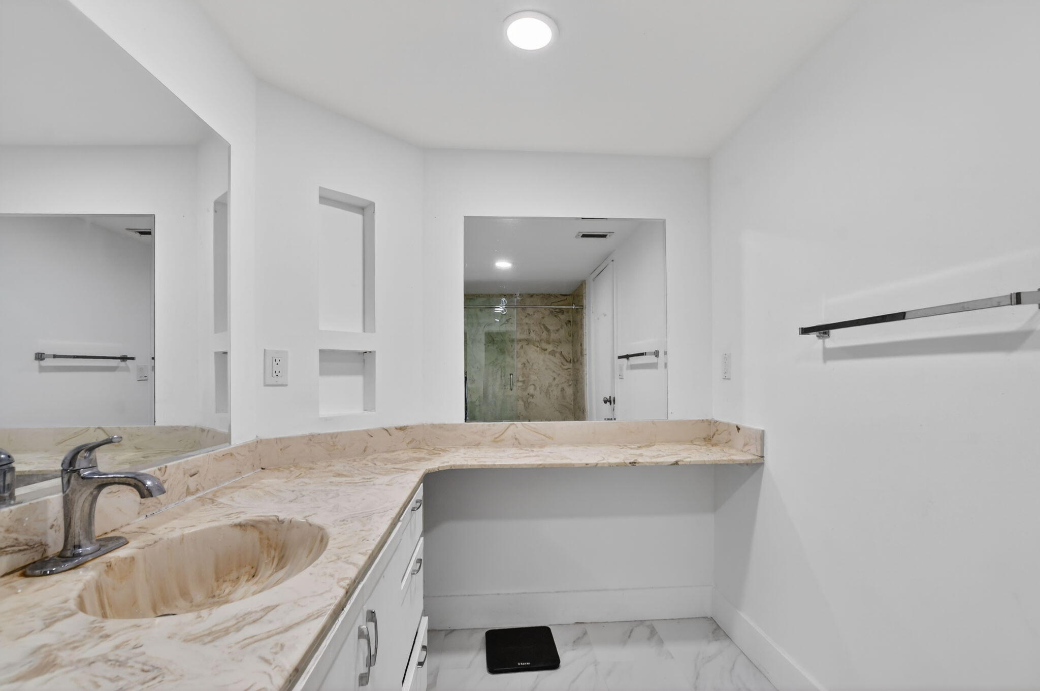 9903 Boca Gardens Trail Boca Raton, FL 33496 - Photo 22 of 37 a bathroom with a sink and a mirror