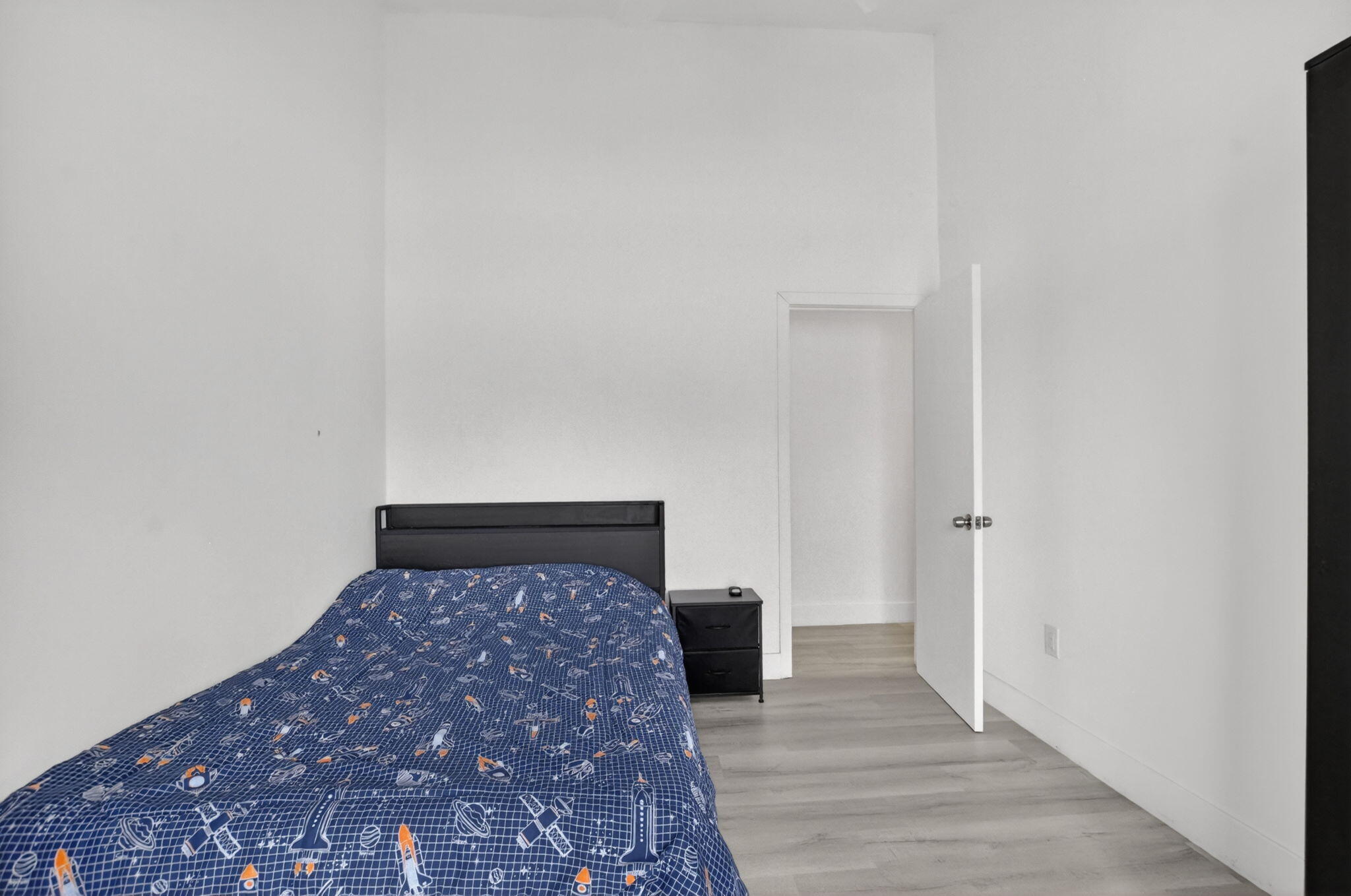 9903 Boca Gardens Trail Boca Raton, FL 33496 - Photo 24 of 37 a view of a hallway with wooden floor