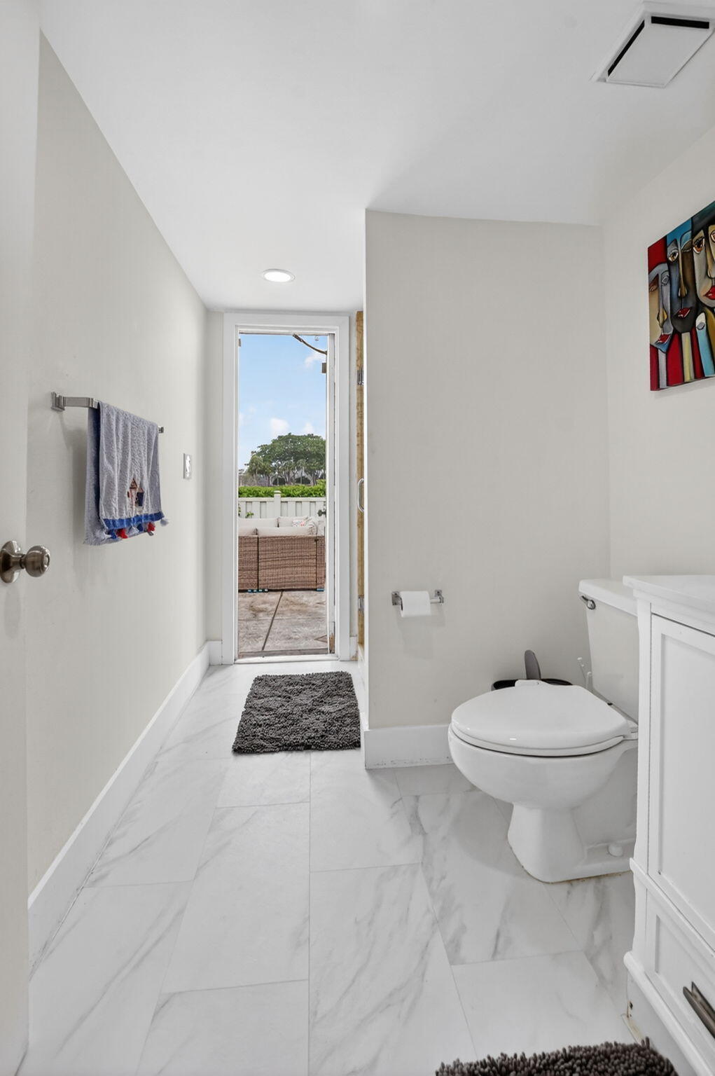 9903 Boca Gardens Trail Boca Raton, FL 33496 - Photo 29 of 37 a bathroom with a sink a toilet and shower