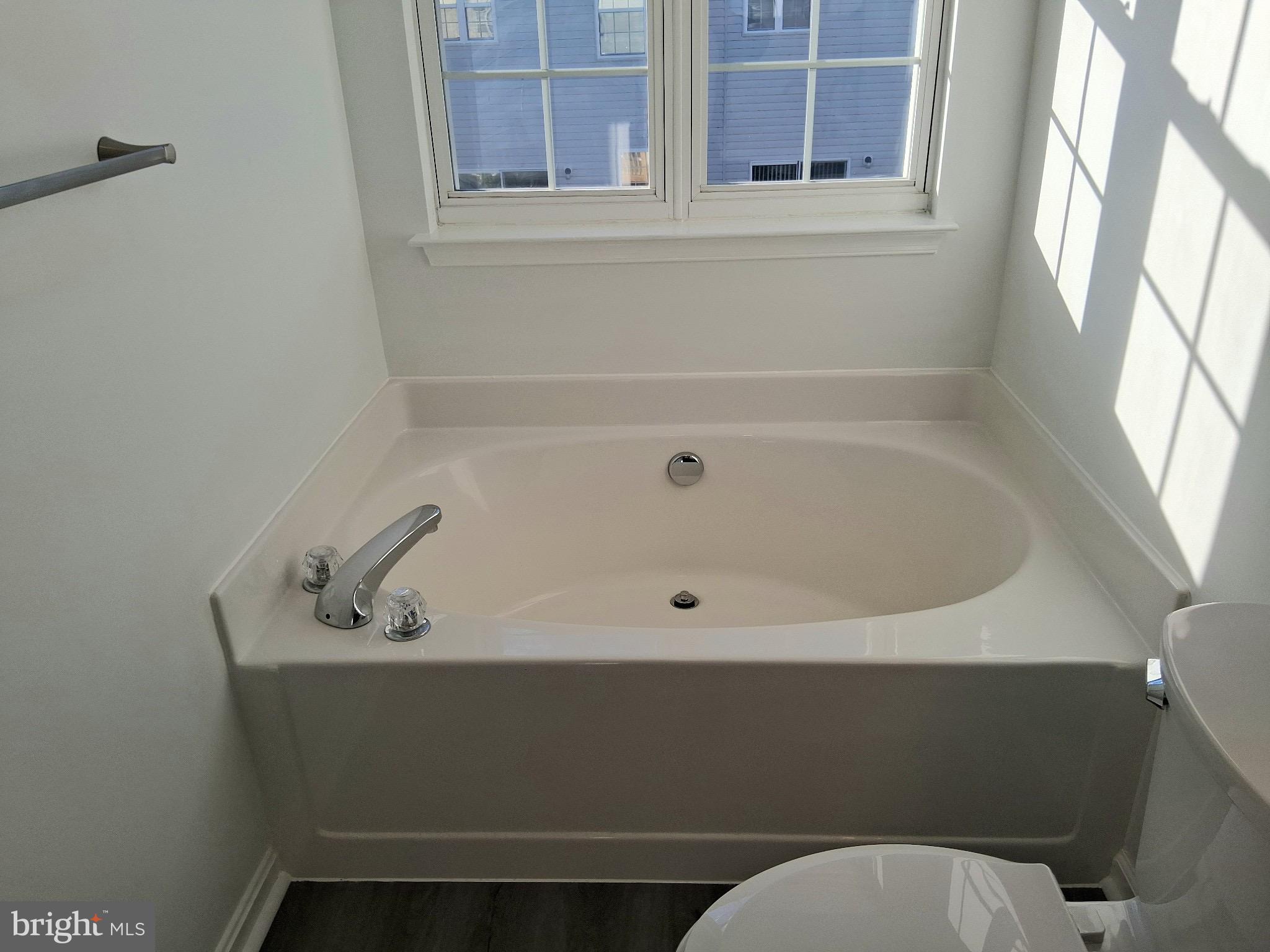 662 Luthardt Road Middle River, MD 21220 - Photo 49 of 52 a bathroom with a sink and a window