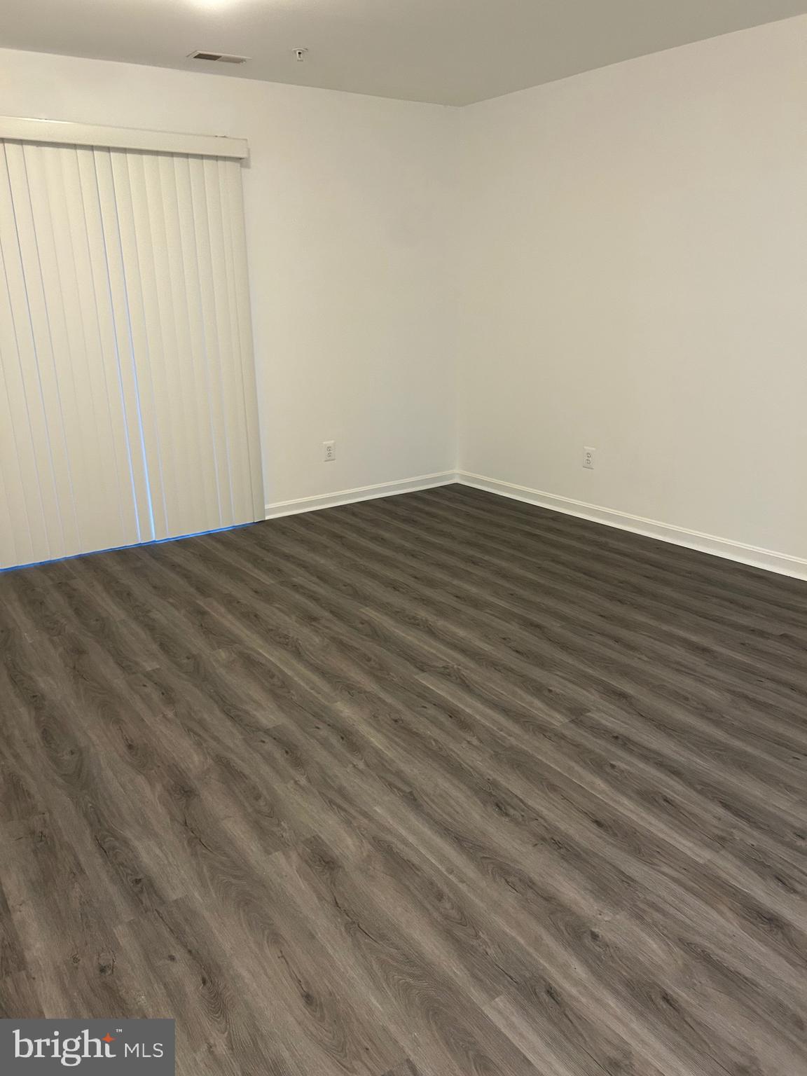 662 Luthardt Road Middle River, MD 21220 - Photo 8 of 52 a view of empty room with wooden floor
