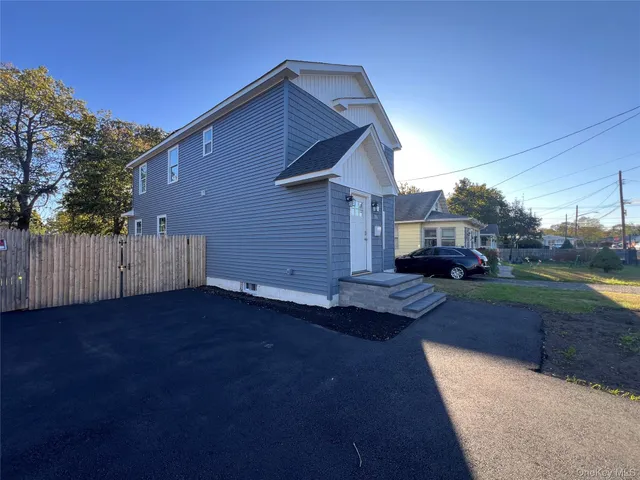 a house view with a garden space