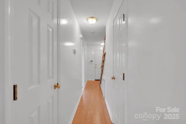 a view of a bathroom with a mirror