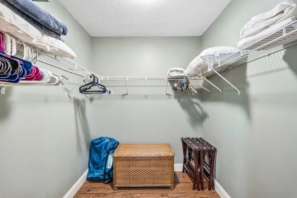 a bathroom with a double vanity sink mirror and toilet