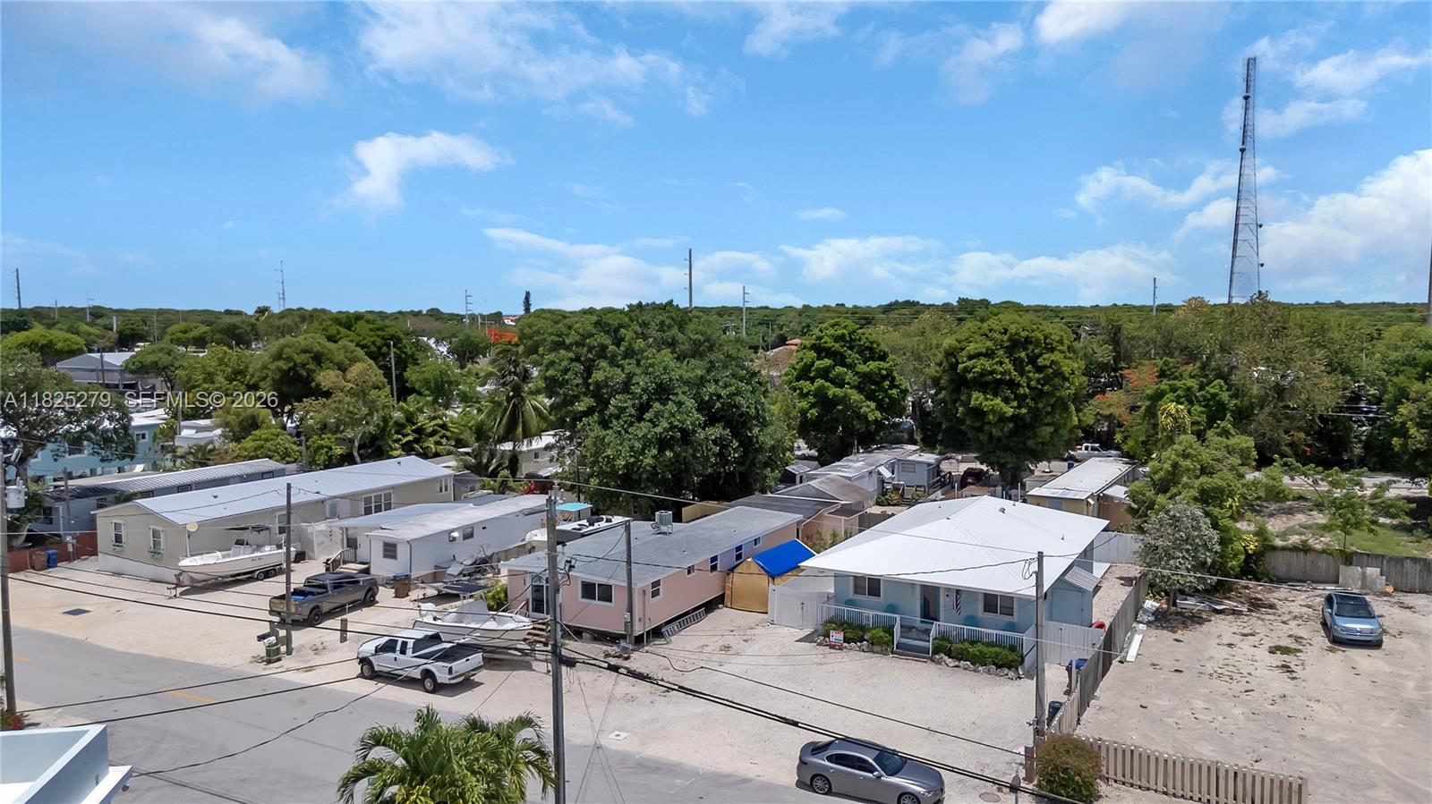 939 Plantation Road Key Largo, FL 33037 - Photo 34 of 40 an aerial view of a house with a garden