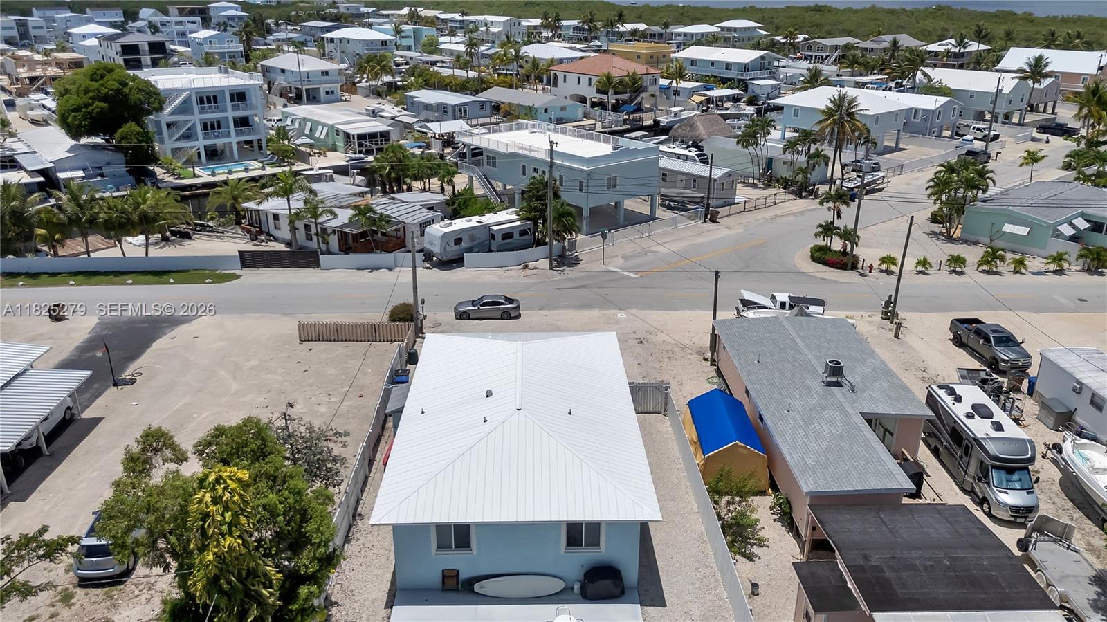 939 Plantation Road Key Largo, FL 33037 - Photo 38 of 40 an aerial view of a city with lots of residential buildings