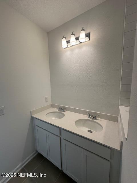 33 Chaste Tree Lane St. Augustine, FL 32092 - Photo 13 of 34 a bathroom with a sink and a mirror