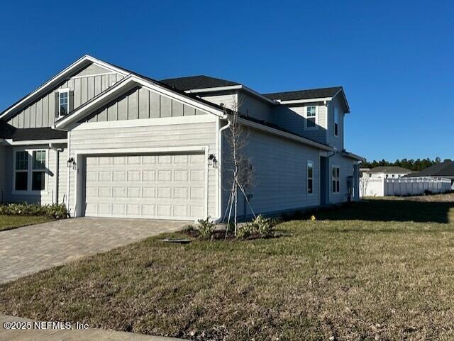 33 Chaste Tree Lane St. Augustine, FL 32092 - Photo 2 of 34 a view of a house with a yard