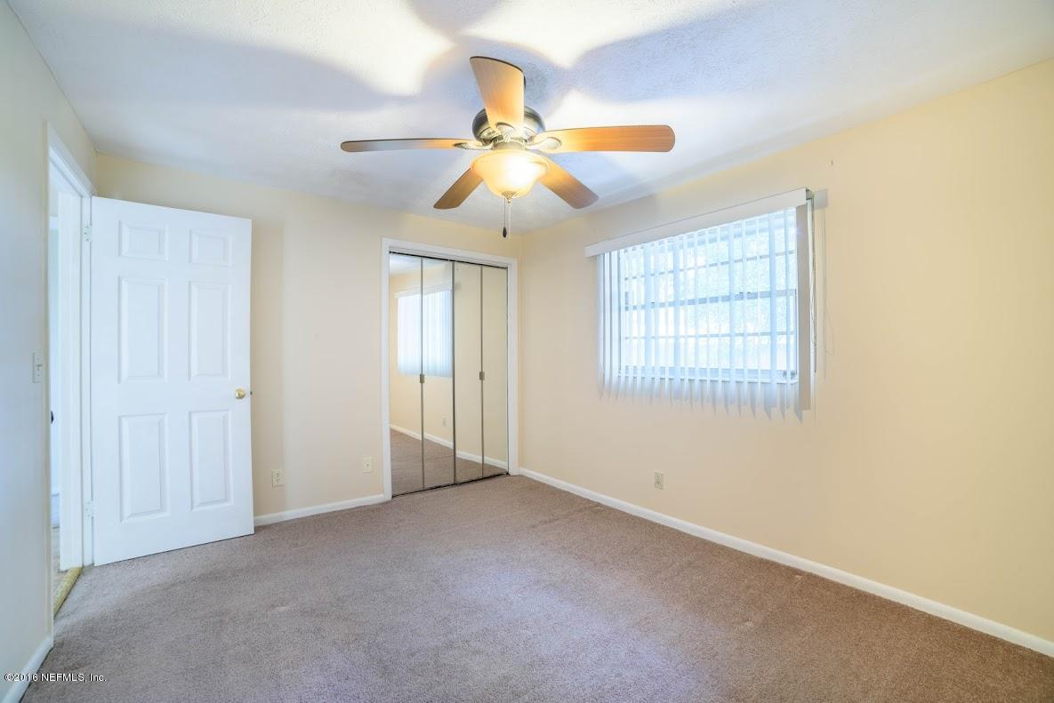 3888 Raintree Road Jacksonville, FL 32277 - Photo 14 of 26 6. 2nd Bedroom