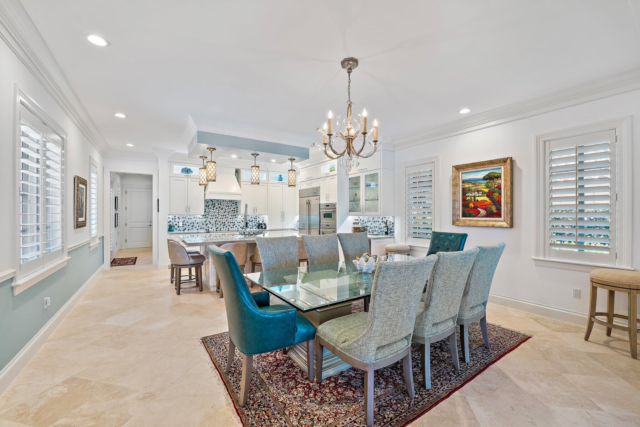 438 Red Hawk Drive Jupiter, FL 33477 - Photo 63 of 116 a view of a dining room with furniture window and wooden floor