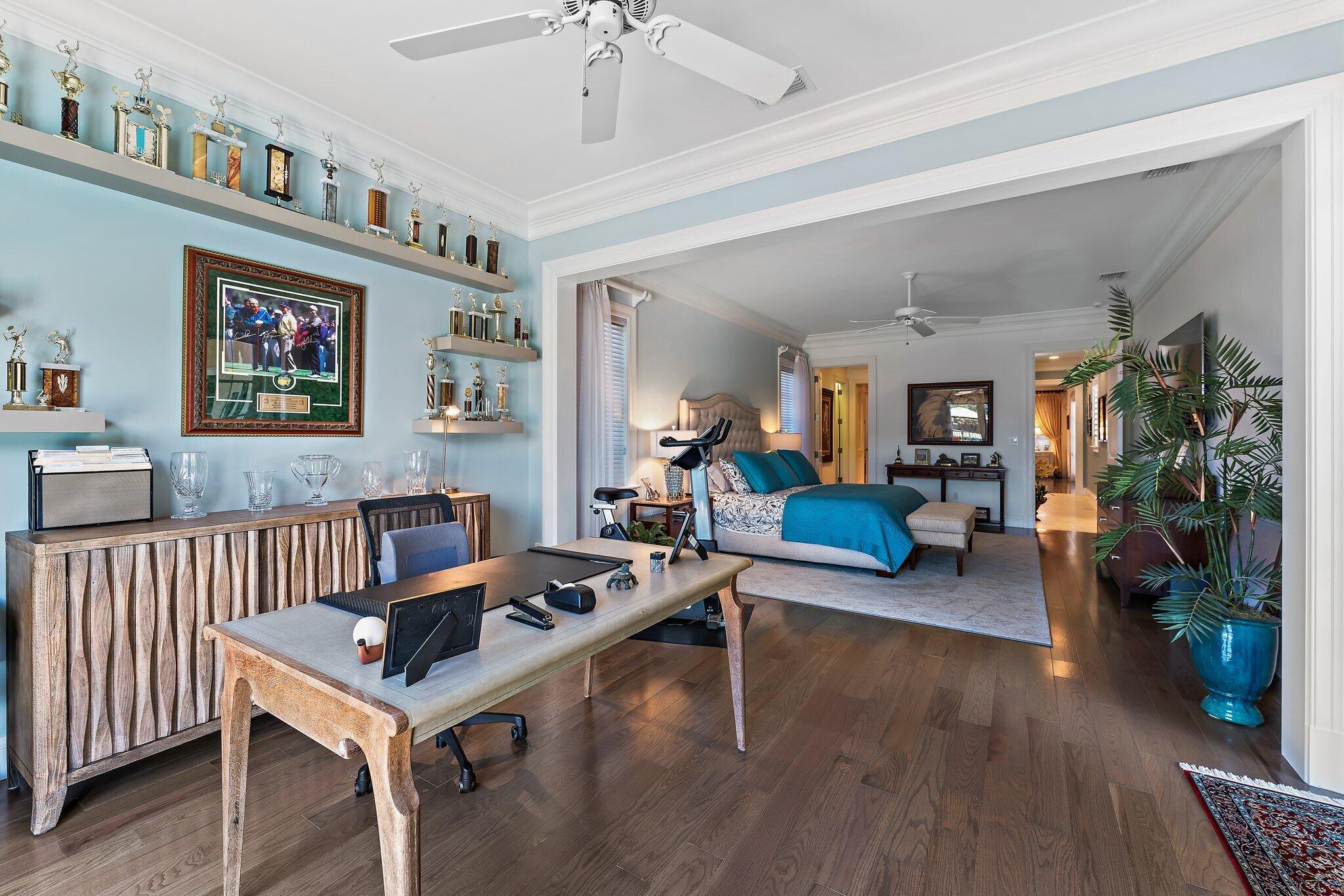 438 Red Hawk Drive Jupiter, FL 33477 - Photo 78 of 116 a living room with furniture and a wooden floor