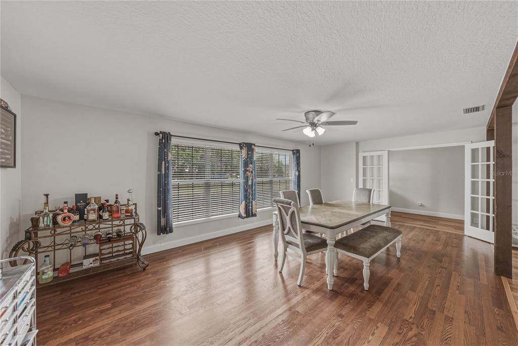 609 West Pipkin Road Lakeland, FL 33813 - Photo 21 of 72 a living room with furniture and wooden floor