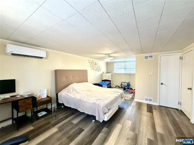 a bedroom with a bed and a table in it